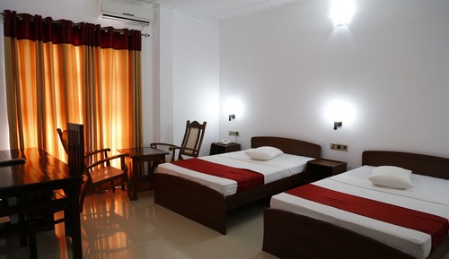 Habitación triple Deluxe