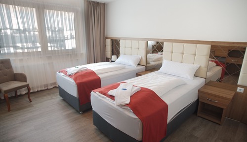 Habitación Confort con 1 cama doble o 2 individuales (3 OG)