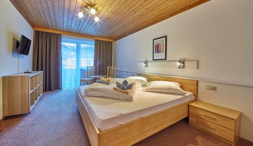 Habitación triple, balcón