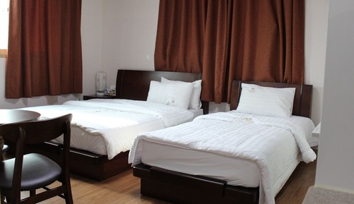 Habitación con 2 camas individuales