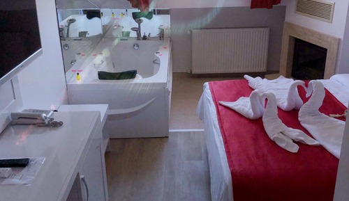 Habitación Deluxe doble, 1 cama de matrimonio grande, bañera de hidromasaje