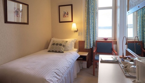 Habitación individual, vistas parciales al mar