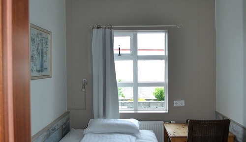 Habitación individual, baño compartido
