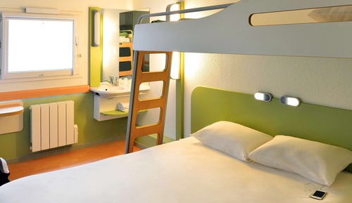 Habitación triple, varias camas