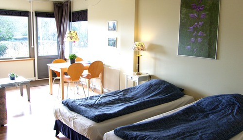 Habitación familiar, baño privado, vistas al jardín