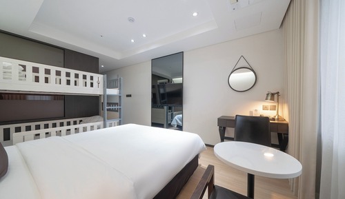 Habitación cuádruple Deluxe