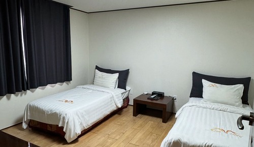 Habitación con 2 camas individuales
