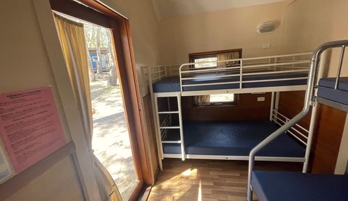Habitación, varias camas