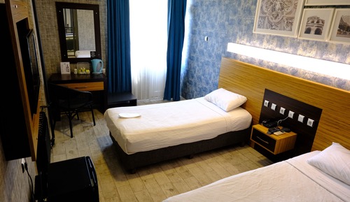 Habitación estándar con 1 cama doble o 2 individuales