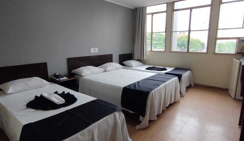 Habitación triple, varias camas