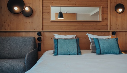 Habitación triple superior, varias camas