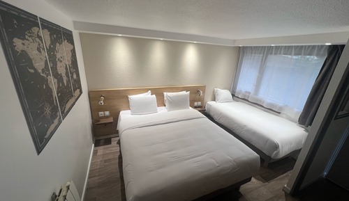 Habitación, varias camas
