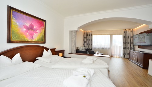 Habitación doble superior, en la zona del jardín (Tirol Sued)
