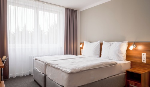 Habitación estándar con 1 cama doble o 2 individuales
