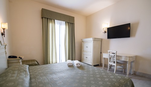 Habitación estándar con 1 cama doble o 2 individuales