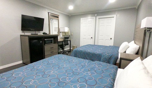 Habitación Deluxe, 2 camas de matrimonio, no fumadores