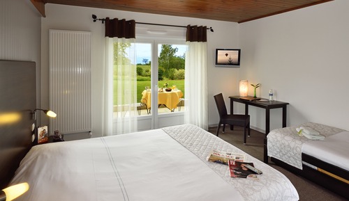 Habitación triple familiar, varias camas