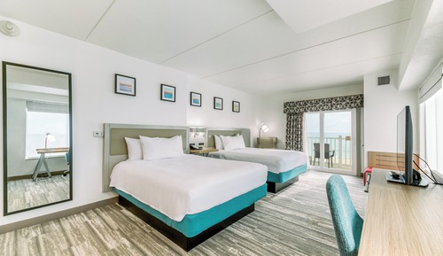 Habitación Deluxe, 2 camas de matrimonio, balcón, frente al mar