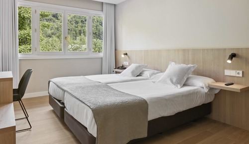 Habitación con 2 camas individuales