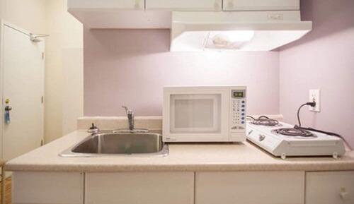 Habitación Deluxe con 2 camas individuales, baño compartido