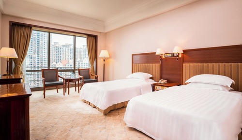 Habitación Business con 1 cama doble o 2 individuales, vistas a la ciudad