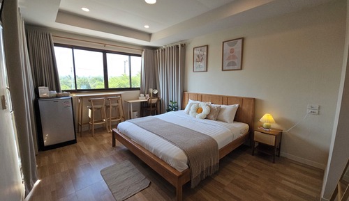 Habitación superior, 1 cama de matrimonio grande, patio, en la zona del jardín