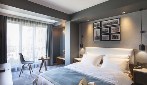 Habitación Deluxe con 1 cama doble o 2 individuales, fumadores, vistas a la ciudad
