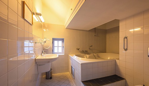 Suite, en una planta alta
