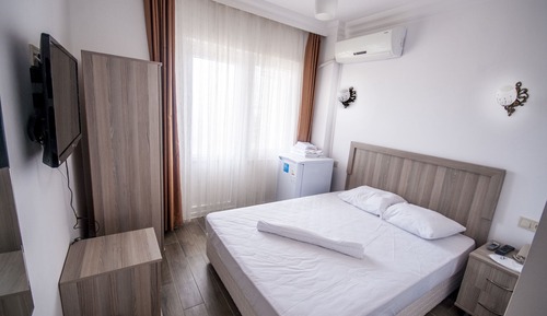 Habitación estándar con 1 cama doble o 2 individuales