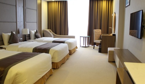 Habitación triple Deluxe