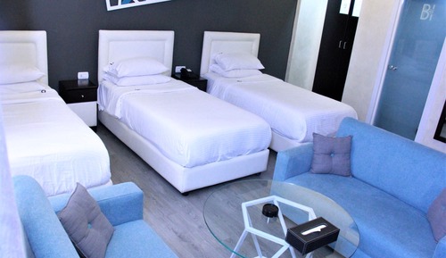 Habitación triple Deluxe, 3 camas individuales, vistas al patio