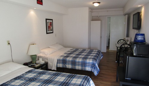 Habitación triple Deluxe (Deluxe Room One Queen, One Single)