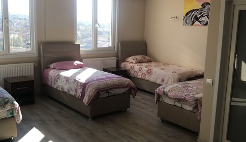 Suite básica, varias camas