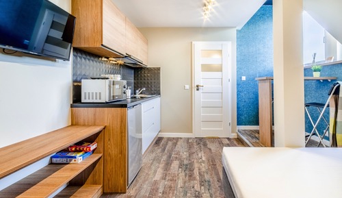 Suite estudio, 2 camas individuales, cocina básica