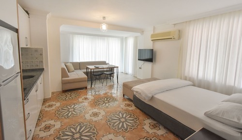 Suite estudio, 1 cama de matrimonio con sofá cama, cocina, vistas a la ciudad