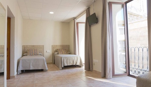 Habitación superior, varias camas