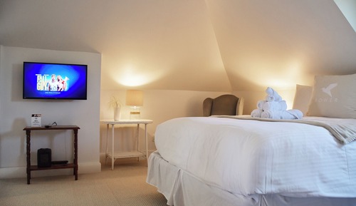 Suite ejecutiva, 2 camas de matrimonio, cocina básica