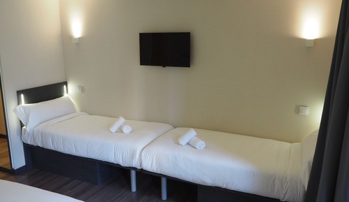 Habitación cuádruple estándar, varias camas