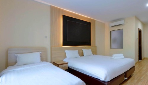 Habitación familiar, varias camas