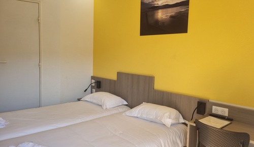 Habitación triple, varias camas