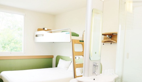 Habitación triple, varias camas