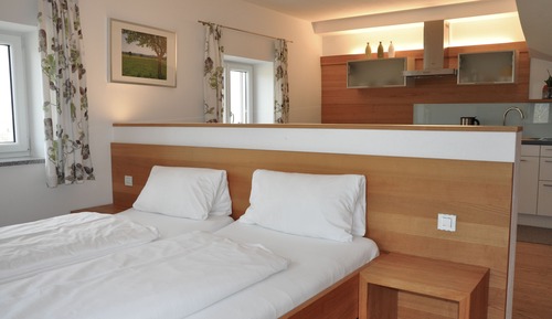 Habitación triple, vistas al jardín