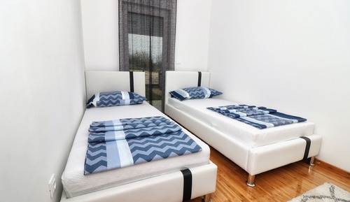 Apartamento superior, planta baja