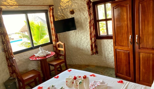 Chalet junior, 1 cama de matrimonio, vistas al jardín, en la zona del jardín (Air Conditioned)