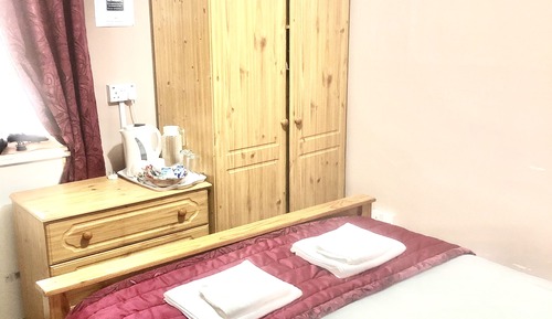 Habitación doble, baño compartido, planta baja