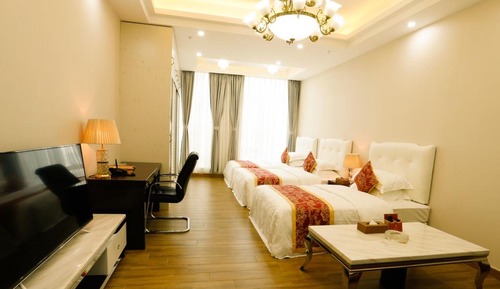 Habitación triple Deluxe