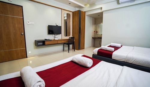 Habitación cuádruple Deluxe