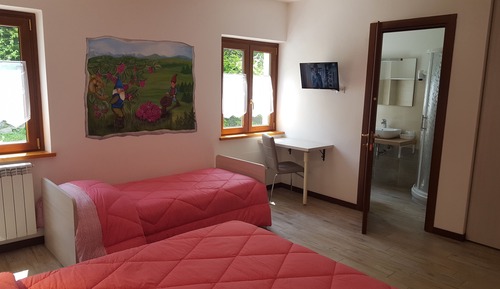 Habitación triple, varias camas