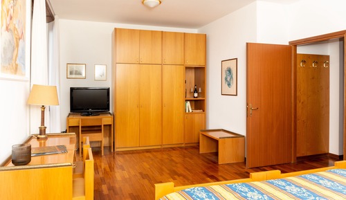 Habitación Elite con 1 cama doble o 2 individuales, vistas al lago