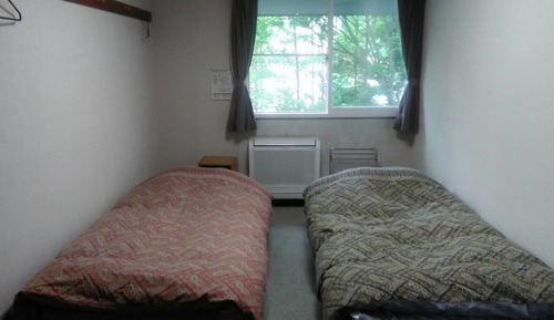 Habitación con 2 camas individuales